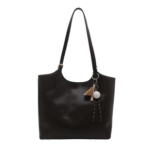 Dark brown retro soft leather tote bag with baseball charm and adjustable strap