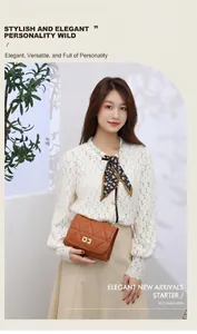 Detail showing brown quilted crossbody bag with gold square lock and triangle stitching