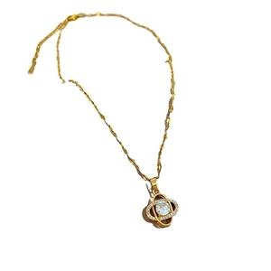 Luxurious titanium steel clover necklace with sparkling crystals and gold chain plating