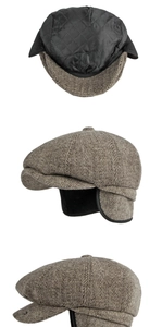 Détails d'une casquette gavroche à chevrons marron avec doublure et protège-oreilles