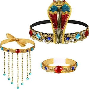 Detail of golden Egyptian cobra headpiece and matching jewelry with red and blue gems
