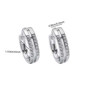 Detail view of silver cubic zirconia hoop earrings showing precise 1.1cm diameter measurement