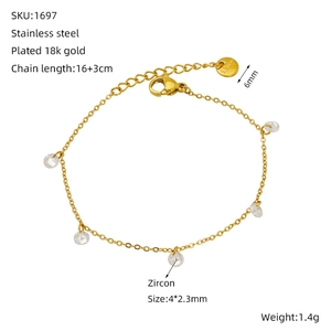 Detail view of 18K gold plated stainless steel chain bracelet with five round zircons