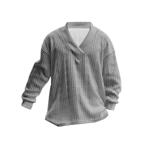 Close-up of gray V-neck sweater showing detailed cable knit texture and high-quality fabric