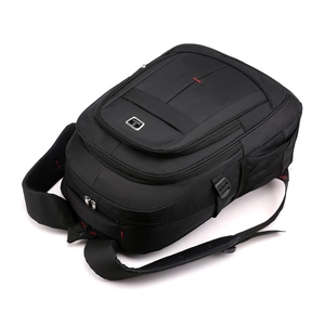Detail of multi-layer zipper compartments and breathable mesh side pocket on black backpack