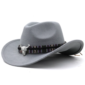 Gray felt western cowboy hat with ethnic woven band and silver bull skull ornament
