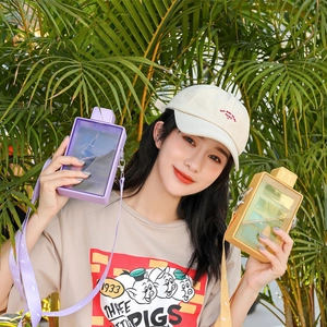 Creative juice box shaped crossbody water bottles in yellow and purple with straps