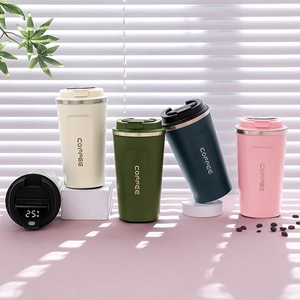 Detail of insulated coffee mugs with LED temperature display in four assorted colors