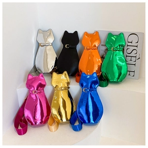 Collection of cat-shaped patent leather crossbody bags in seven metallic gloss finishes