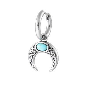 Detail of 316L stainless steel crescent moon earring with blue stone and celtic engraving