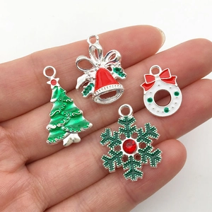 Set of 4 Christmas alloy pendants with tree, bell, wreath, and snowflake patterns