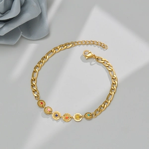 Colorful gemstone gold chain bracelet with six vibrant beads and Figaro chain link detail