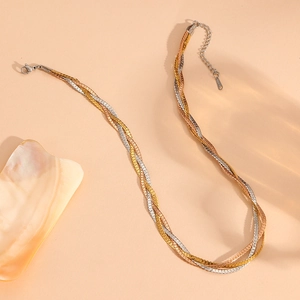 Three-tone braided herringbone necklace set in gold, silver and rose gold steel