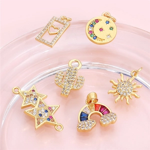 Gold-plated alloy charms with colorful cubic zirconia in star, moon and sun shapes