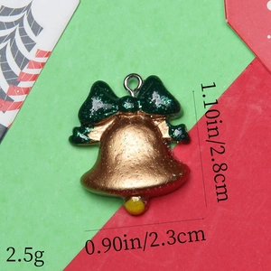 Christmas bell resin pendant with green glitter bow, 2.8cm height and 2.3cm width detail