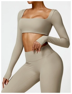 Detailed texture of khaki long sleeve yoga crop top and high waist leggings set