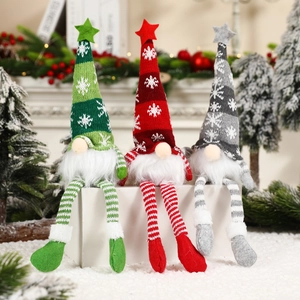Three Christmas gnomes set in red, green and grey colors with warm glowing LED lights