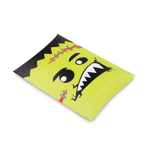 Yellow pillow candy box with monster print for party gifts and snack packaging