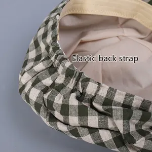 Green and white plaid linen flat cap with adjustable elastic band on back for women