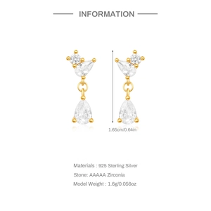 Detailed view of teardrop 925 silver earrings in gold with AAAAA zircon stones