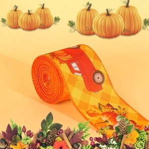 Detail of harvest ribbon with vintage red truck, pumpkin and maple leaf patterns