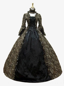 Detail of Victorian gothic dress with bronze lace patterns and ruffled sleeves