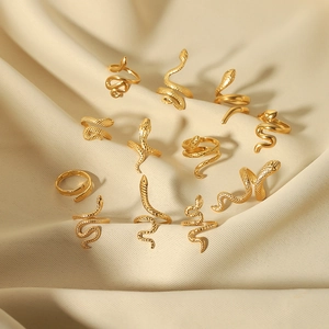 Set of 11 vintage 18K gold-plated snake rings in various coiled adjustable designs