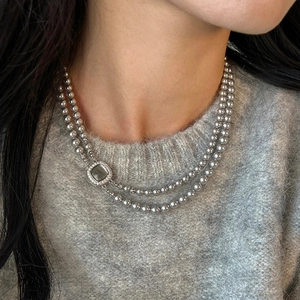 Double-layered geometric pearl necklace with zircon buckle in French vintage luxury style