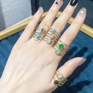 Gold plated stainless steel rings set with colorful natural stones and wave patterns
