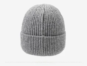 Detailed back view of gray knitted beanie showing thick ribbed texture and rolled edge