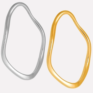 Close-up of irregular 304 stainless steel bangles in gold and silver finishes