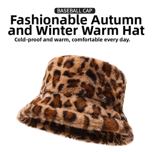 Close-up of fluffy leopard print bucket hat made of thick warm plush faux fur material
