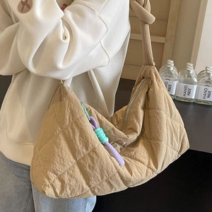 Large khaki quilted nylon tote bag for women with minimalist diamond lattice pattern