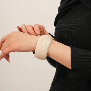 Minimalist wide cream white faceted resin bangle bracelet with luxury polished finish
