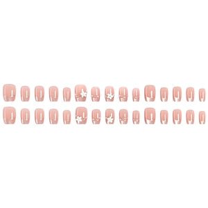French cat-eye press-on nails with 3D white flowers and pearl accents in nude pink