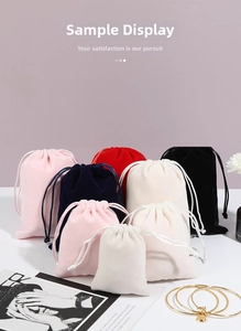Various sizes and colors of drawstring velvet pouches for jewelry and gift storage