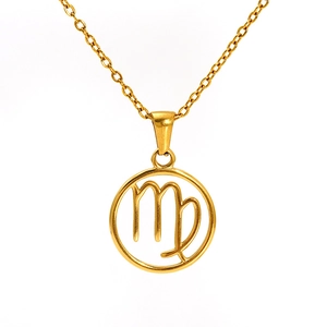 Macro detail of gold Virgo constellation pendant on a delicate stainless steel O-chain