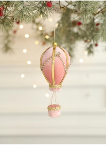 Pink velvet hot air balloon Christmas ornament with gold glitter and pearl details