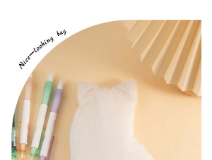 Close-up of white plush cat ear stationery bag with soft faux fur and pencil storage