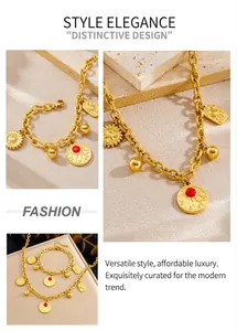 Macro detail of retro gold sun pendant necklace and bracelet set with red gemstone