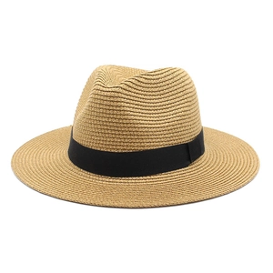 Neutral Panama straw hat with black ribbon for sun protection and summer fashion