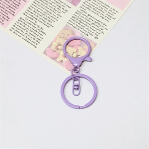 Close-up of purple matte lacquer lobster clasp with split ring for DIY accessories
