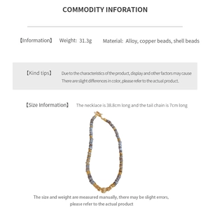 Detailed size chart of beaded shell necklace with OT clasp and metal bead accents