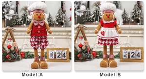 Detail of gingerbread man Christmas plush dolls with knit texture in festive setting