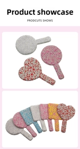 Detail view showing variety of heart-shaped handheld mirrors with sparkly rhinestones