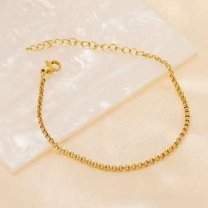 Detail of minimalist 18K gold plated stainless steel chain with lobster clasp and extender