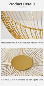 Detail of golden iron fruit basket featuring smooth welding and baking paint finish