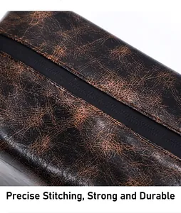 Detail shot of heavy-duty stitching and vintage cracked texture on PU leather toiletry bag