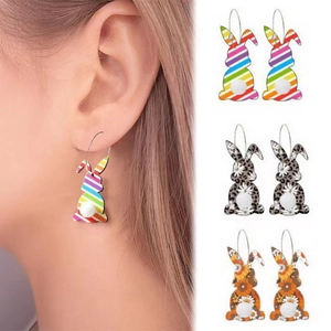 Easter bunny earrings with floral, leopard, and striped patterns and white pom tails