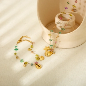 Gold starfish shell necklace and bracelet set with colorful stones and freshwater pearls